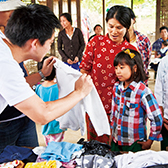 First visited refugee camps in Thailand and Nepal